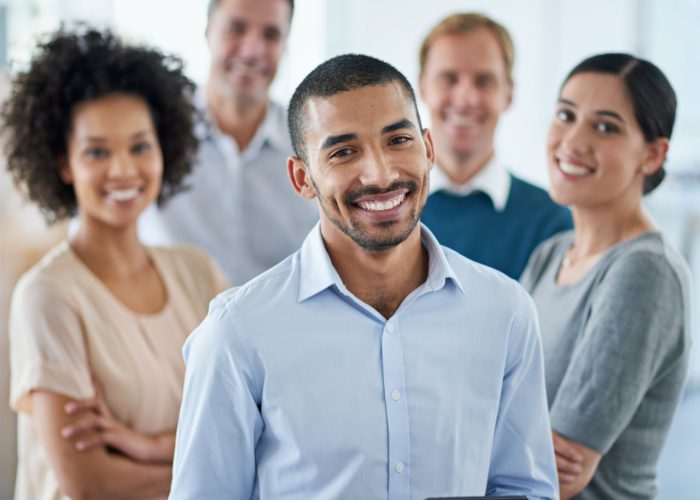 all-set-success-portrait-group-diverse-colleagues-standing-office